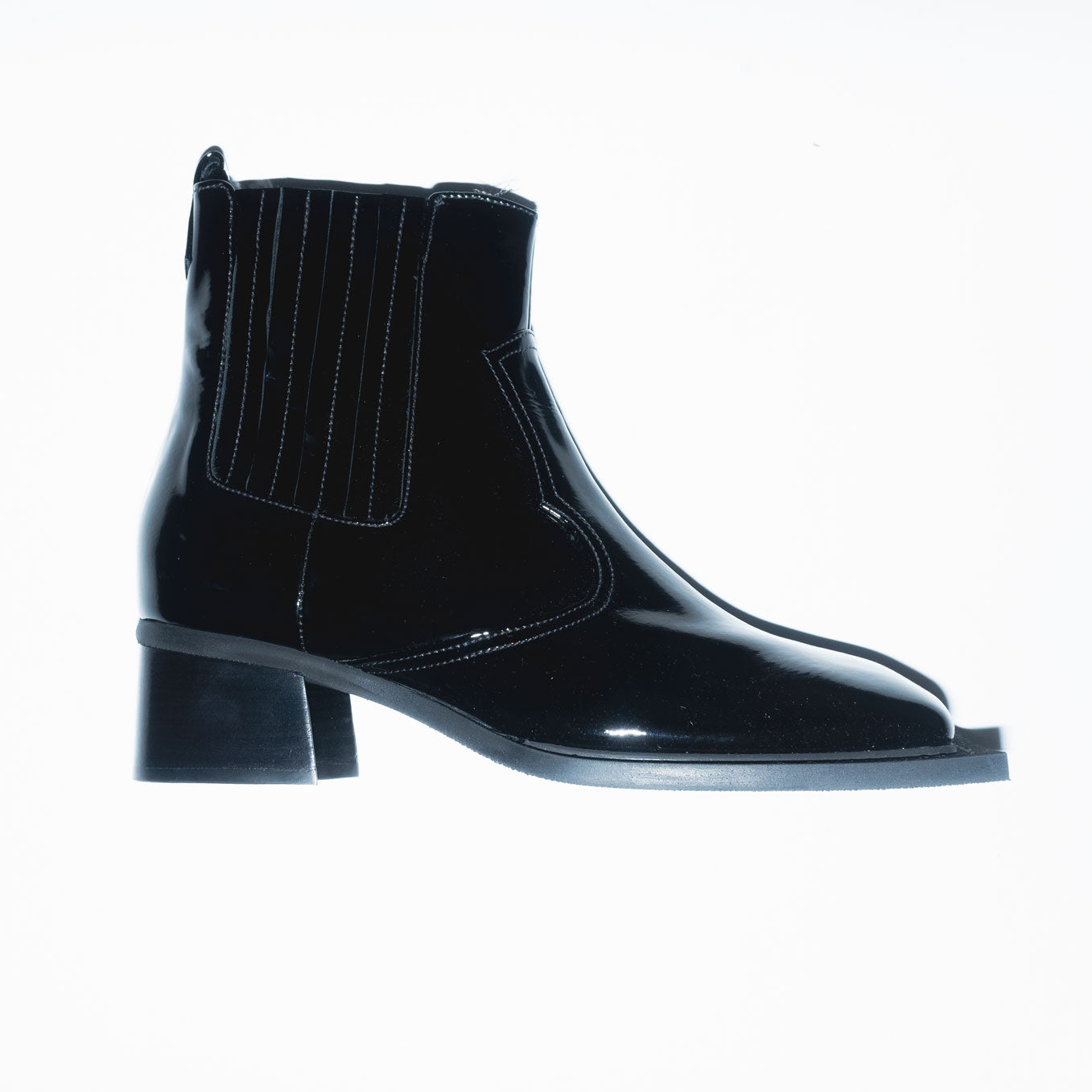 Runway Howler Ankle Boots in Black Patent Leather