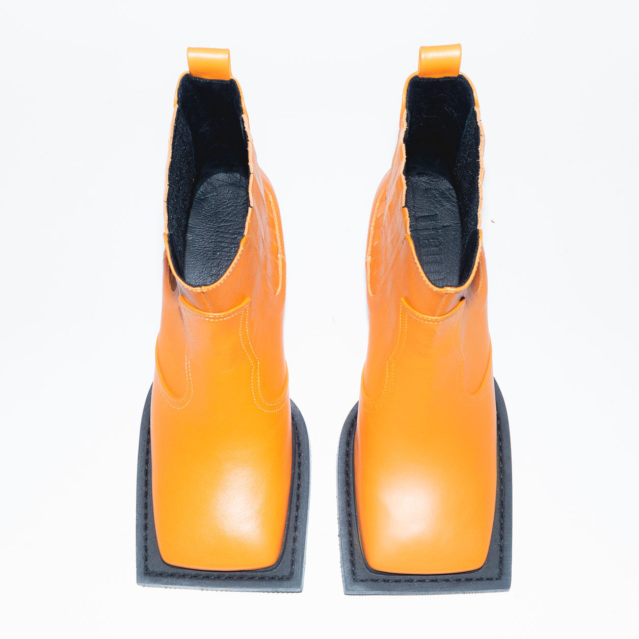 Archive Howler Ankle Boots in Orange Leather