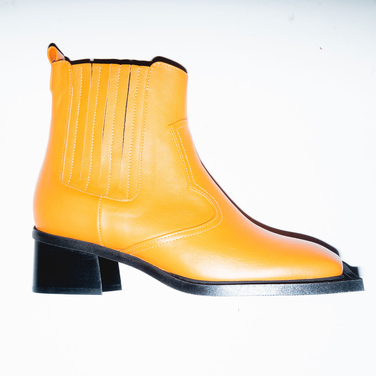 Archive Howler Ankle Boots in Orange Leather