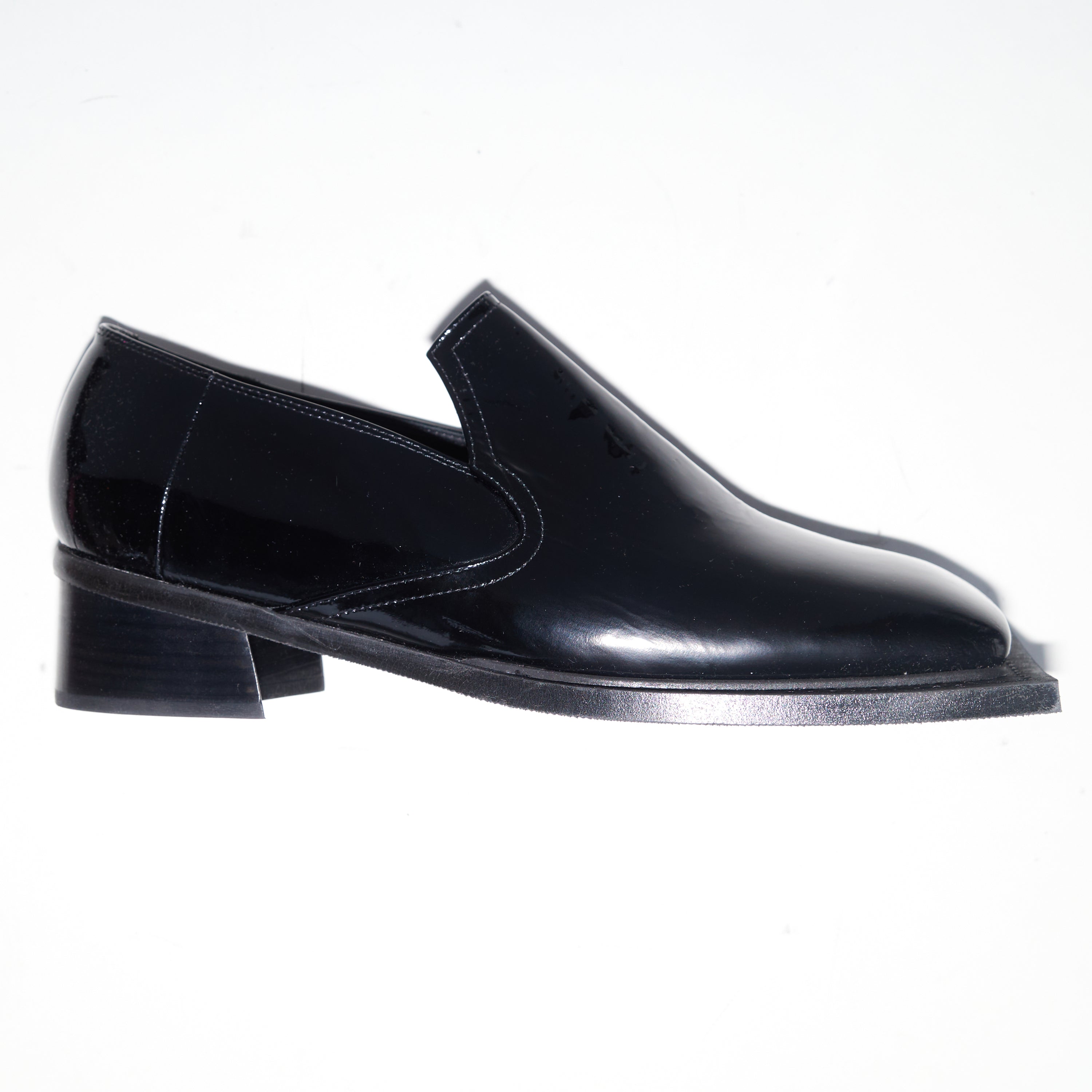 Howled in Patent Black Leather